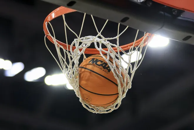 Feb 4, 2023; Cincinnati, Ohio, USA; The NCAA logo is seen on a Wilson game ball during a free throw attempt in the game between the UCF Knights and the Cincinnati Bearcats in the second half at Fifth Third Arena.