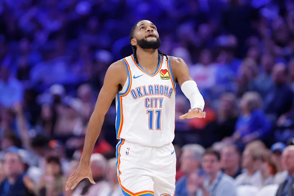 Jan 5, 2026; Oklahoma City, Oklahoma, USA; Oklahoma City Thunder guard Isaiah Joe (11) gestures after scoring against the Charlotte Hornets during the second half at Paycom Center. Mandatory Credit: Alonzo Adams-Imagn Images