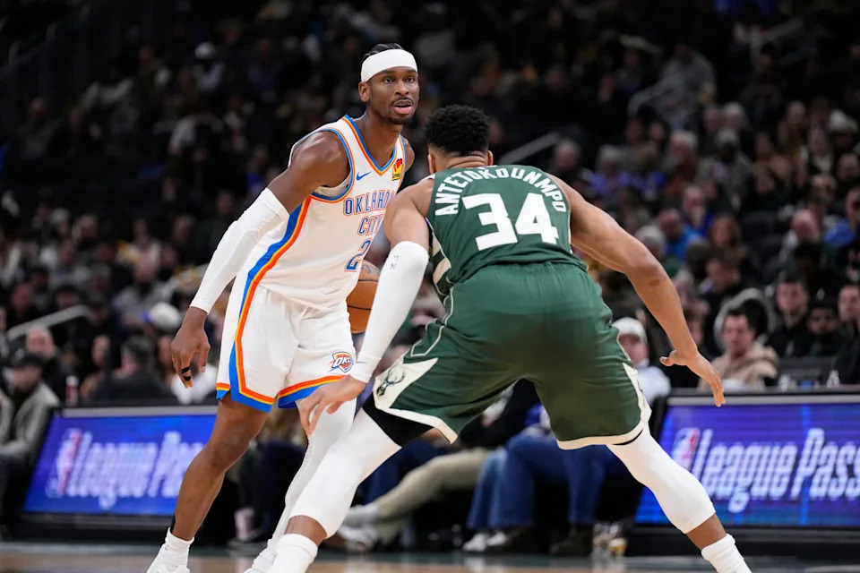 Jan 21, 2026; Milwaukee, Wisconsin, USA; Oklahoma City Thunder guard Shai Gilgeous-Alexander (2) drives against Milwaukee Bucks forward Giannis Antetokounmpo (34) in the first half at Fiserv Forum. Mandatory Credit: Michael McLoone-Imagn Images