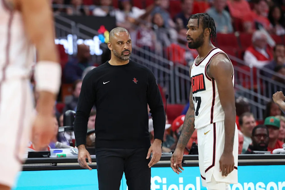 Mar 17, 2025; Houston, Texas, USA; Houston Rockets head coach Ime Udoka reacts with forward Tari Eason (17) after Eason fouled out during the fourth quarter against the Philadelphia 76ers at Toyota Center. Mandatory Credit: Troy Taormina-Imagn Images
