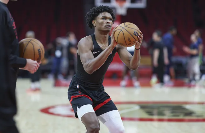 Dec 27, 2024; Houston, Texas, USA; Houston Rockets forward Amen Thompson (1) warms up before a game against the Minnesota Timberwolves at Toyota Center. Mandatory Credit: Troy Taormina-Imagn Images