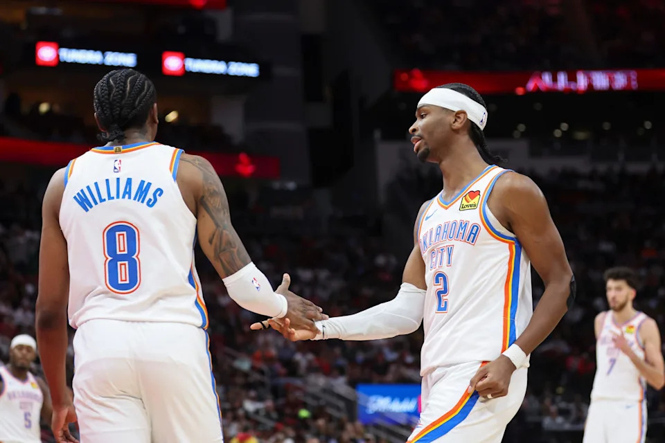 Jan 15, 2026; Houston, Texas, USA; Oklahoma City Thunder guard Jalen Williams (8) and guard Shai Gilgeous-Alexander (2) react after a play during the third quarter against the Houston Rockets at Toyota Center. Mandatory Credit: Troy Taormina-Imagn Images