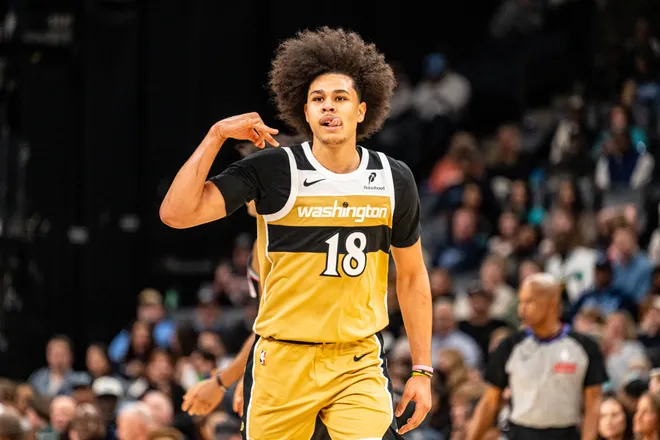 Dec 20, 2025; Memphis, Tennessee, USA; Washington Wizards Forward Kyshawn George (18) celebrates after hitting a three point shot in the third quarter against the Memphis Grizzlies at FedExForum. Mandatory Credit: Matthew Smith-Imagn Images