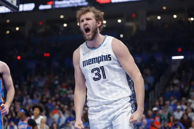 Dec 22, 2025; Oklahoma City, Oklahoma, USA; Memphis Grizzlies center Jock Landale (31) screams after dunking against the Oklahoma City Thunder during the first quarter at Paycom Center. Mandatory Credit: Alonzo Adams-Imagn Images
