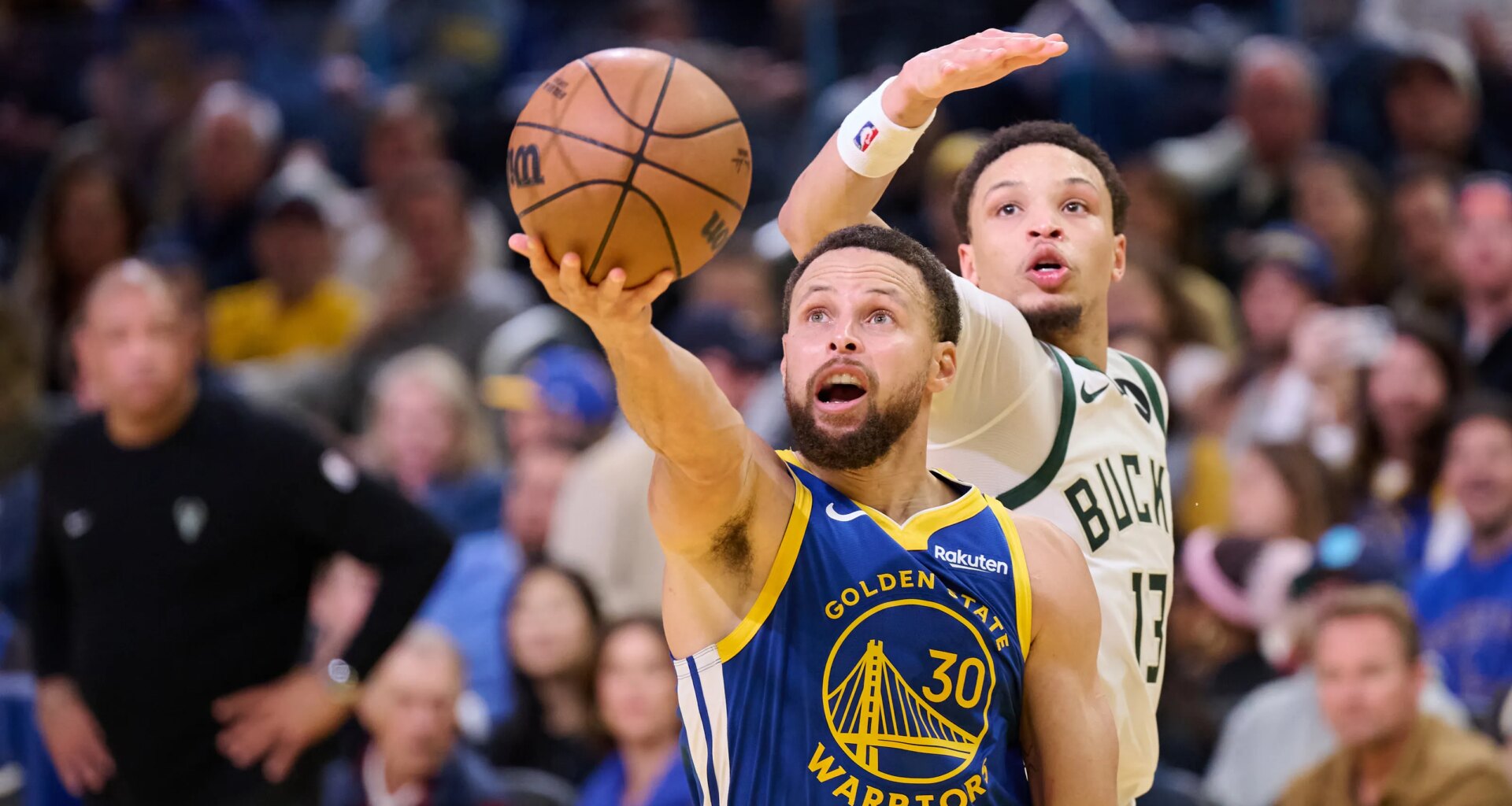 Warriors open homestand with 120-113 win over Bucks