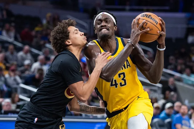 Jan 6, 2026; Indianapolis, Indiana, USA; Indiana Pacers forward Pascal Siakam (43) dribbles the ball while Cleveland Cavaliers guard Craig Porter Jr. (9) defends in the second half at Gainbridge Fieldhouse.