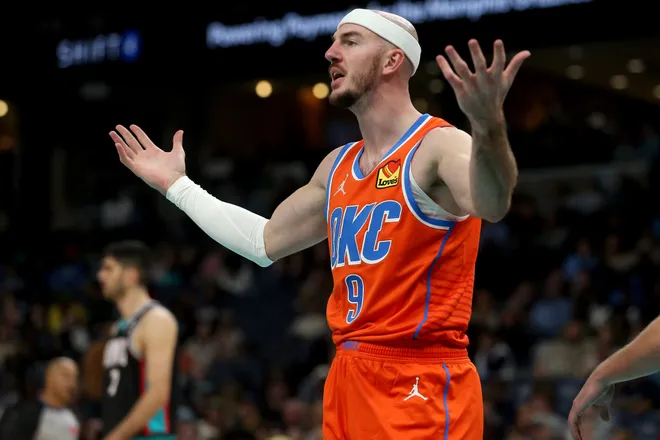 Jan 9, 2026; Memphis, Tennessee, USA; Oklahoma City Thunder guard Alex Caruso (9) reacts during the third quarter against the Memphis Grizzlies at FedExForum. Mandatory Credit: Petre Thomas-Imagn Images