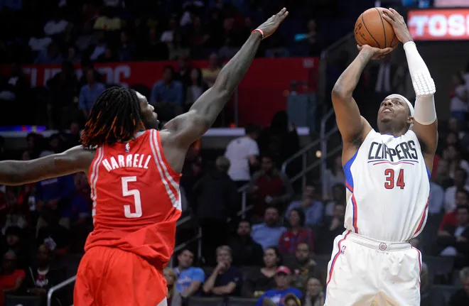 April 10, 2017; Los Angeles, CA, USA; Los Angeles Clippers forward Paul Pierce (34) shoots a basket against the defense of Houston Rockets forward Montrezl Harrell (5 )during the second half at Staples Center. Pierce moved to fifteenth all time on the NBA scoring list. Mandatory Credit: Gary A. Vasquez-USA TODAY Sports