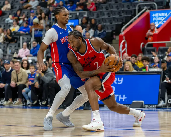 Jan 10, 2026; Detroit, Michigan, USA; Detroit Pistons forward Ausar Thompson (9) defends against LA Clippers forward Kawhi Leonard (2) during the first quarter at Little Caesars Arena. Mandatory Credit: David Reginek-Imagn Images