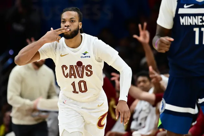 Jan 10, 2026; Cleveland, Ohio, USA; Cleveland Cavaliers guard Darius Garland (10) celebrates after hitting a three point basket against the Minnesota Timberwolves during the second half at Rocket Arena. Mandatory Credit: Ken Blaze-Imagn Images