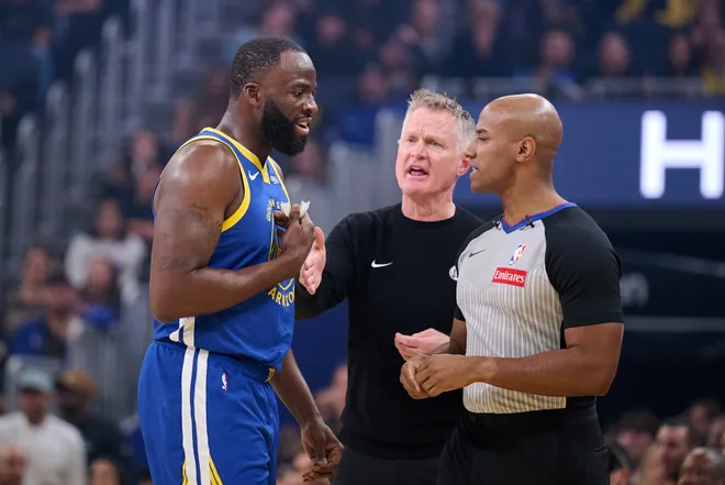 Jan 7, 2026; San Francisco, California, USA; Golden State Warriors forward Draymond Green (23) and head coach Steve Kerr argue a call made by referee John Butler (30) during the first quarter against the Milwaukee Bucks at Chase Center. Mandatory Credit: Robert Edwards-Imagn Images