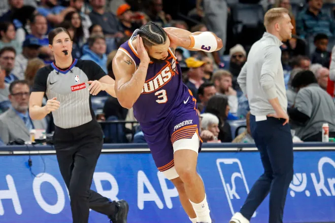 Jan 7, 2026; Memphis, Tennessee, USA; Phoenix Suns forward Dillon Brooks (3) reacts after a three-point basket during the third quarter against the Memphis Grizzlies at FedExForum. Mandatory Credit: Petre Thomas-Imagn Images