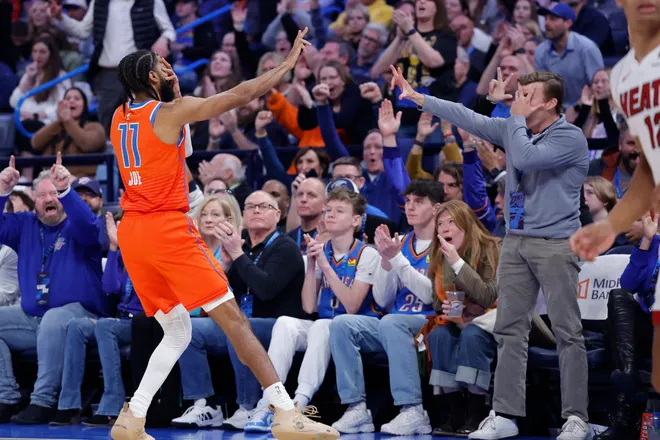 Jan 11, 2026; Oklahoma City, Oklahoma, USA; Oklahoma City Thunder guard Isaiah Joe (11) gestures after scoring a three point basket against the Miami Heat during the second half at Paycom Center. Mandatory Credit: Alonzo Adams-Imagn Images