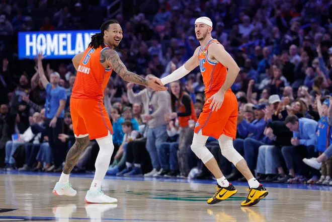 Jan 11, 2026; Oklahoma City, Oklahoma, USA; Oklahoma City Thunder forward Jaylin Williams (6) and guard Alex Caruso (9) celebrate after scoring against the Miami Heat during the second half at Paycom Center. Mandatory Credit: Alonzo Adams-Imagn Images