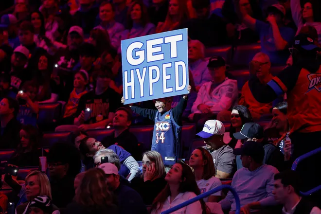 Jan 11, 2026; Oklahoma City, Oklahoma, USA; An Oklahoma City Thunder fan holds a sign to hype up the crowd during a time out against the Miami Heat during the second half at Paycom Center. Mandatory Credit: Alonzo Adams-Imagn Images