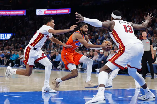 Jan 11, 2026; Oklahoma City, Oklahoma, USA; Oklahoma City Thunder guard Isaiah Joe (11) drives to the basket against the Miami Heat during the second half at Paycom Center. Mandatory Credit: Alonzo Adams-Imagn Images