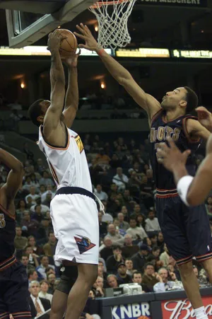 12 Mar 2001: Corie Blount #40 of the Golden State Warriors has his shot blocked by Mark Strickland #30 of the Denver Nuggets at the Arena in Oakland during their game in Oakland, California. DIGITAL IMAGE. NOTE TO USER: It is expressly understood that the only rights Allsport are offering to license in this Photograph are one-time, non-exclusive editorial rights. No advertising or commercial uses of any kind may be made of Allsport photos. User acknowledges that it is aware that Allsport is an editorial sports agency and that NO RELEASES OF ANY TYPE ARE OBTAINED from the subjects contained in the photographs. Mandatory Credit: Tom Hauck/ALLSPORT