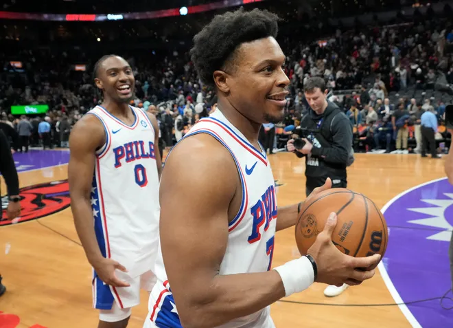 Jan 12, 2026; Toronto, Ontario, CAN; Philadelphia 76ers guard Kyle Lowry (7) and guard Tyrese Maxey (0) smile as they leave the court after a win over the Toronto Raptors at Scotiabank Arena. Mandatory Credit: John E. Sokolowski-Imagn Images