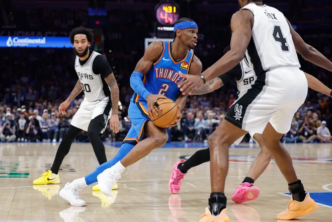Jan 13, 2026; Oklahoma City, Oklahoma, USA; Oklahoma City Thunder guard Shai Gilgeous-Alexander (2) drives to the basket against the San Antonio Spurs during the second half at Paycom Center. Mandatory Credit: Alonzo Adams-Imagn Images