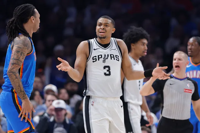 Jan 13, 2026; Oklahoma City, Oklahoma, USA; San Antonio Spurs forward/guard Keldon Johnson (3) reacts after a call against him after a play against the Oklahoma City Thunder during the second quarter at Paycom Center. Mandatory Credit: Alonzo Adams-Imagn Images