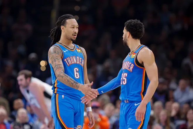 Jan 13, 2026; Oklahoma City, Oklahoma, USA; Oklahoma City Thunder forward Jaylin Williams (6) and guard Ajay Mitchell (25) celebrate after a play against the San Antonio Spurs during the second quarter at Paycom Center. Mandatory Credit: Alonzo Adams-Imagn Images