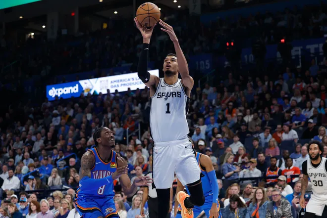 Jan 13, 2026; Oklahoma City, Oklahoma, USA; San Antonio Spurs forward/center Victor Wembanyama (1) shoots against the Oklahoma City Thunder during the second quarter at Paycom Center. Mandatory Credit: Alonzo Adams-Imagn Images