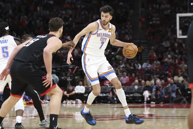 Jan 15, 2026; Houston, Texas, USA; Oklahoma City Thunder center Chet Holmgren (7) dribbles the ball during the third quarter against the Houston Rockets at Toyota Center.