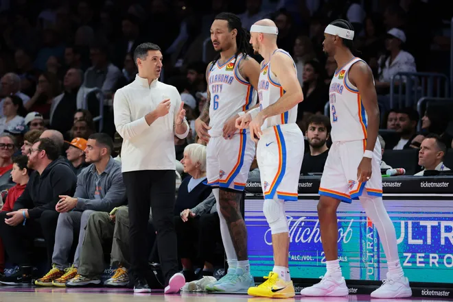 Jan 17, 2026; Miami, Florida, USA; Oklahoma City Thunder head coach Mark Daigneault speaks to forward Jaylin Williams (6), guard Alex Caruso (9), and guard Shai Gilgeous-Alexander (2) against the Miami Heat during the fourth quarter at Kaseya Center. Mandatory Credit: Sam Navarro-Imagn Images