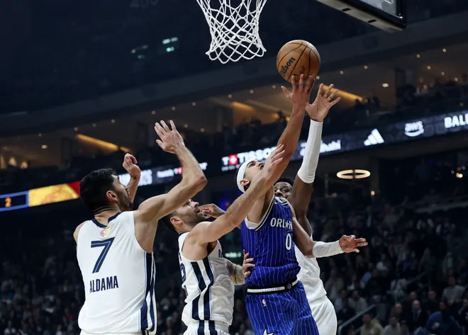 BERLIN, GERMANY - JANUARY 15: Anthony Black #0 of the Orlando Magic scores whilst under pressure during the NBA Match between Memphis Grizzlies and Orlando Magic at Uber Arena on January 15, 2026 in Berlin, Germany. NOTE TO USER: User expressly acknowledges and agrees that, by downloading and or using this photograph, user is consenting to the terms and conditions of the Getty Images License Agreement. (Photo by Maja Hitij/Getty Images)