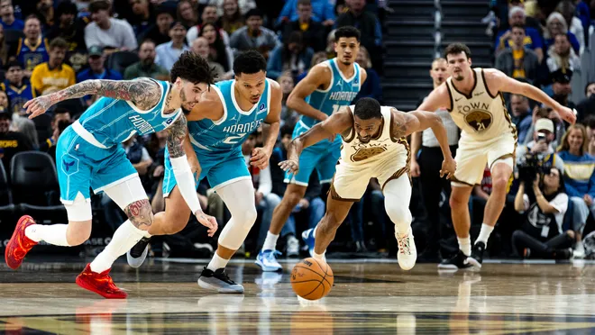 Jan 17, 2026; San Francisco, California, USA; Charlotte Hornets guard LaMelo Ball (1), forward Grant Williams (2) and Golden State Warriors center Quinten Post (21) scramble for a loose ball during the third quarter at Chase Center. Mandatory Credit: John Hefti-Imagn Images