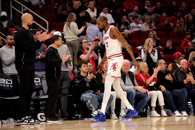 Jan 18, 2026; Houston, Texas, USA; Houston Rockets forward Kevin Durant (7) shakes hands with fans courtside after leaving the game against the New Orleans Pelicans during the fourth quarter at Toyota Center. Mandatory Credit: Erik Williams-Imagn Images
