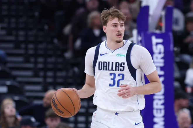 Jan 8, 2026; Salt Lake City, Utah, USA; Dallas Mavericks forward Cooper Flagg (32) brings the ball up the court against the Utah Jazz during the first quarter at Delta Center. Mandatory Credit: Rob Gray-Imagn Images
