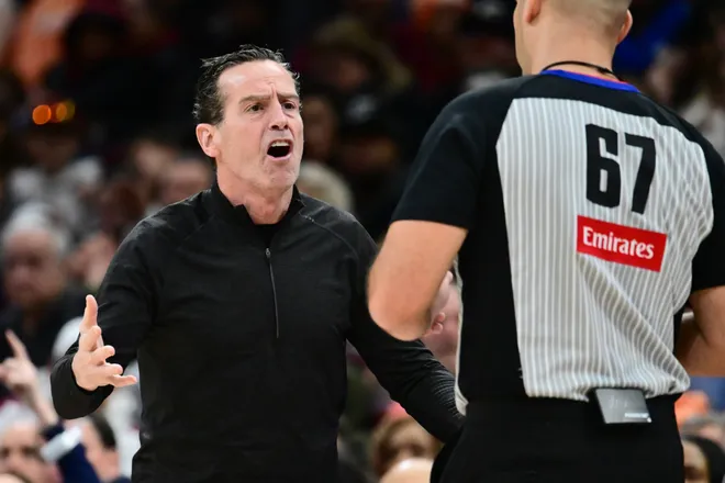 Jan 19, 2026; Cleveland, Ohio, USA; Cleveland Cavaliers head coach Kenny Atkinson argues a call with referee Brandon Adair (67) during the second against the Oklahoma City Thunder half at Rocket Arena. Mandatory Credit: Ken Blaze-Imagn Images