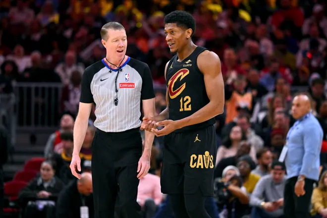 CLEVELAND, OHIO - JANUARY 19: Referee Ed Malloy #7 talks with forward De'Andre Hunter #12 of the Cleveland Cavaliers during the third quarter against the Oklahoma City Thunder at Rocket Arena on January 19, 2026, in Cleveland, Ohio. The Thunder defeated the Cavaliers 136-104. NOTE TO USER: User expressly acknowledges and agrees that, by downloading and or using this photograph, User is consenting to the terms and conditions of the Getty Images License Agreement. (Photo by Jason Miller/Getty Images)
