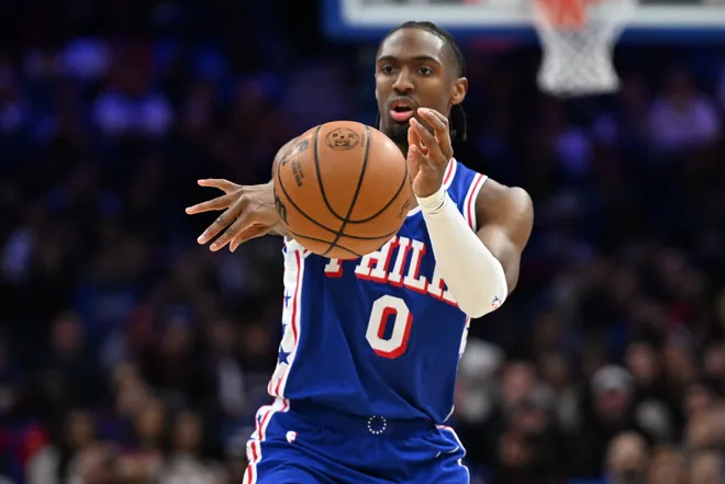 Jan 19, 2026; Philadelphia, Pennsylvania, USA; Philadelphia 76ers guard Tyrese Maxey (0) passes the ball against the Indiana Pacers during the first quarter at Xfinity Mobile Arena. Mandatory Credit: Eric Hartline-Imagn Images