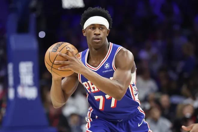 Jan 14, 2026; Philadelphia, Pennsylvania, USA; Philadelphia 76ers guard Vj Edgecombe (77) controls the ball against the Cleveland Cavaliers during the first quarter at Xfinity Mobile Arena. Mandatory Credit: Bill Streicher-Imagn Images