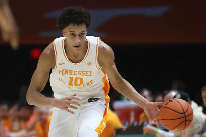 Jan 17, 2026; Knoxville, Tennessee, USA; Tennessee Volunteers forward Nate Ament (10) brings the ball up court against the Kentucky Wildcats during the first half at Thompson-Boling Arena at Food City Center. Mandatory Credit: Randy Sartin-Imagn Images