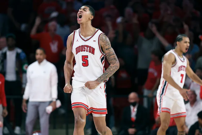 Jan 6, 2026; Houston, Texas, USA; Houston Cougars center Chris Cenac Jr. (5) reacts after a play during the second half against the Texas Tech Red Raiders at Fertitta Center. Mandatory Credit: Troy Taormina-Imagn Images