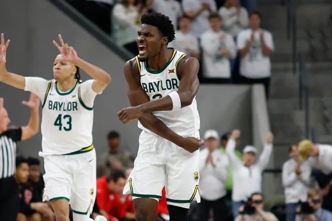 Jan 10, 2026; Waco, Texas, USA; Baylor Bears guard Tounde Yessoufou (24) reacts after scoring a three-point basket during the first half against the Houston Cougars at Paul and Alejandra Foster Pavilion. Mandatory Credit: Chris Jones-Imagn Images
