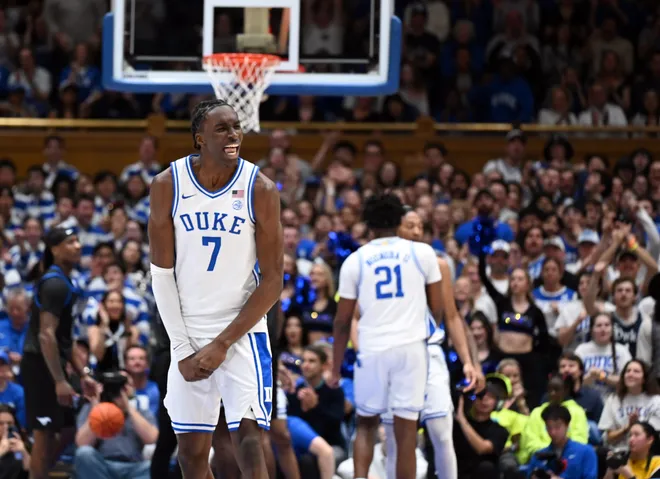 Jan 10, 2026; Durham, North Carolina, USA; Duke Blue Devils forward Dame Sarr (7) reacts during a break in the first half against the Southern Methodist Mustangs at Cameron Indoor Stadium. Mandatory Credit: Rob Kinnan-Imagn Images