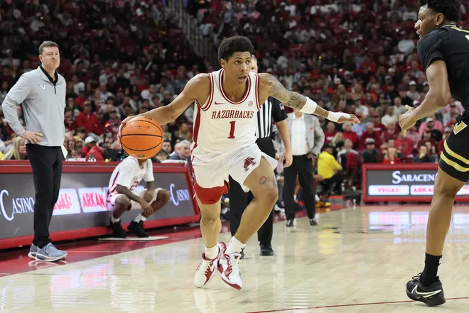 Jan 20, 2026; Fayetteville, Arkansas, USA; Arkansas Razorbacks guard Meleek Thomas (1) drives during the first half against the Vanderbilt Commodores at Bud Walton Arena. Arkansas won 93-68. Mandatory Credit: Nelson Chenault-Imagn Images