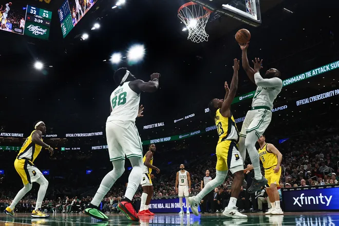 Jan 21, 2026; Boston, Massachusetts, USA;Boston Celtics guard Jaylen Brown (7) shoots over Indiana Pacers guard Aaron Nesmith (23) during the second quarter at TD Garden. Mandatory Credit: Winslow Townson-Imagn Images