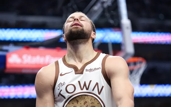 Jan 22, 2026; Dallas, Texas, USA; Golden State Warriors guard Stephen Curry (30) reacts against the Dallas Mavericks during the second half at American Airlines Center.