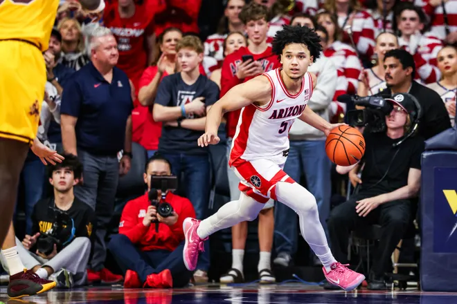 Jan 14, 2026; Tucson, Arizona, USA; Arizona Wildcats guard Brayden Burries (5) dribbles the ball during the second half of the game against the Arizona State Sun Devils at McKale Memorial Center. Mandatory Credit: Aryanna Frank-Imagn Images