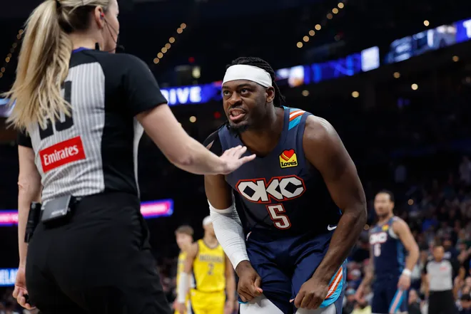 Jan 23, 2026; Oklahoma City, Oklahoma, USA; Oklahoma City Thunder guard Luguentz Dort (5) talks to an official after a play against the Indiana Pacers during the second half at Paycom Center. Mandatory Credit: Alonzo Adams-Imagn Images
