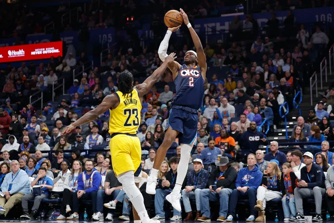 Jan 23, 2026; Oklahoma City, Oklahoma, USA; Oklahoma City Thunder guard Shai Gilgeous-Alexander (2) shoots over Indiana Pacers guard/forward Aaron Nesmith (23) during the second quarter at Paycom Center. Mandatory Credit: Alonzo Adams-Imagn Images