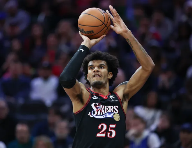 Dec 20, 2025; Philadelphia, Pennsylvania, USA; Philadelphia 76ers forward Dominick Barlow (25) shoots against the Dallas Mavericks during the third quarter at Xfinity Mobile Arena. Mandatory Credit: Bill Streicher-Imagn Images