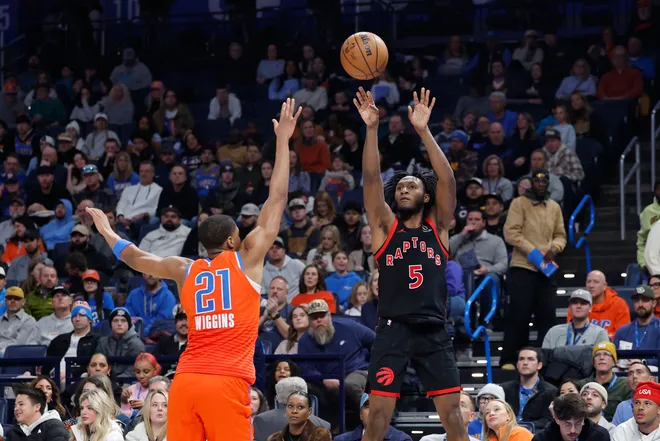 Jan 25, 2026; Oklahoma City, Oklahoma, USA; Toronto Raptors guard Immanuel Quickley (5) shoots over Oklahoma City Thunder guard Aaron Wiggins (21) during the second half at Paycom Center. Mandatory Credit: Alonzo Adams-Imagn Images