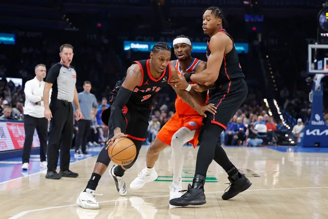 Jan 25, 2026; Oklahoma City, Oklahoma, USA; Toronto Raptors forward/guard RJ Barrett (9) moves the ball around Oklahoma City Thunder guard Shai Gilgeous-Alexander (2) during the second half at Paycom Center. Mandatory Credit: Alonzo Adams-Imagn Images