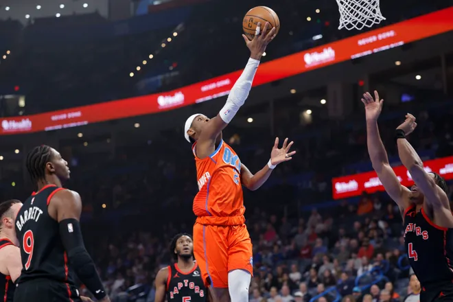 Jan 25, 2026; Oklahoma City, Oklahoma, USA;Oklahoma City Thunder guard Shai Gilgeous-Alexander (2) goes up for a basket against the Toronto Raptorsduring the first quarter at Paycom Center. Mandatory Credit: Alonzo Adams-Imagn Images